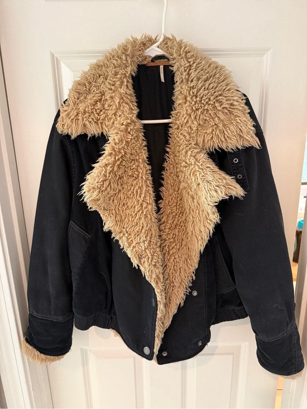 Free People black and tan sherpa bomber
